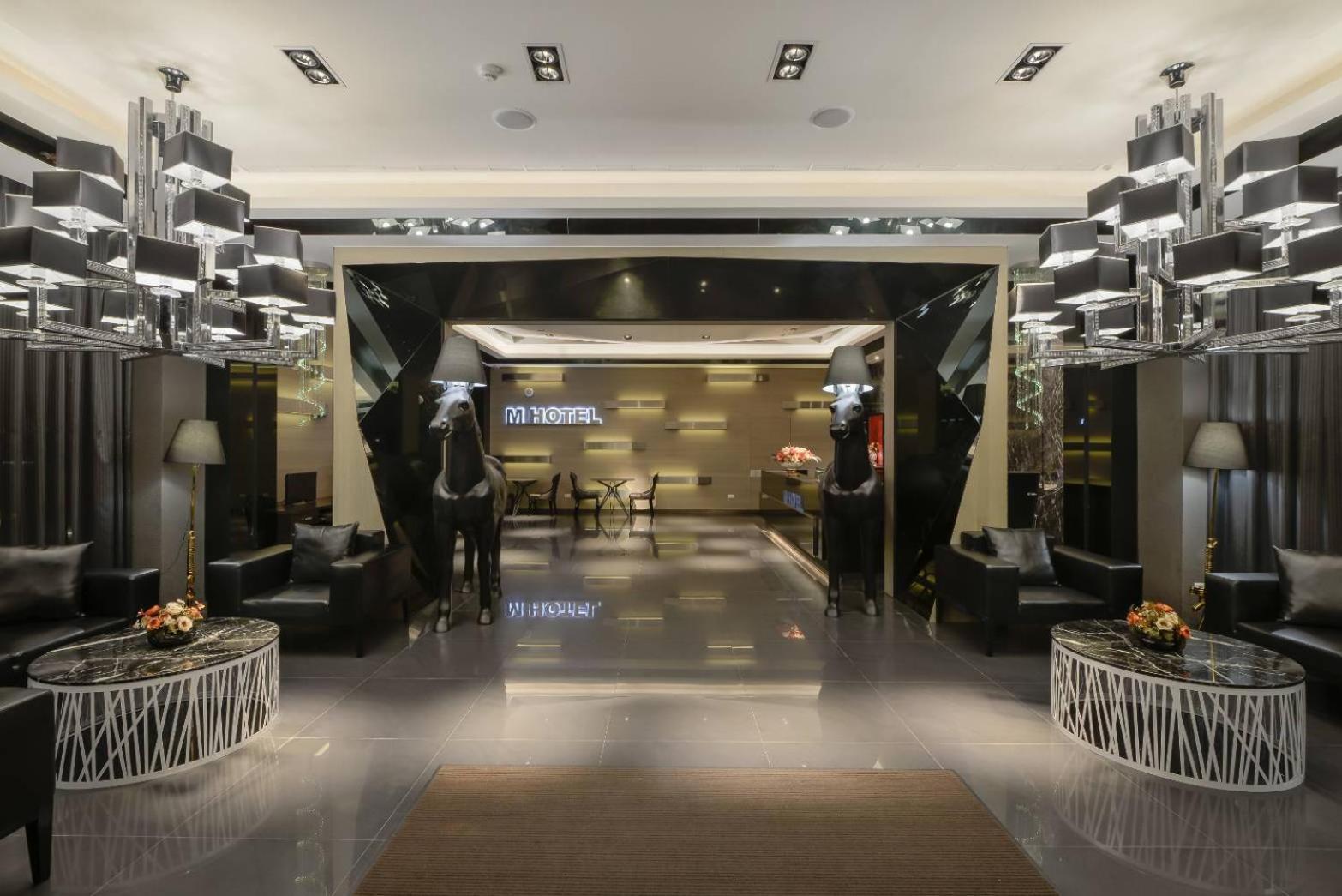 M Hotel Caotun Bagian luar foto