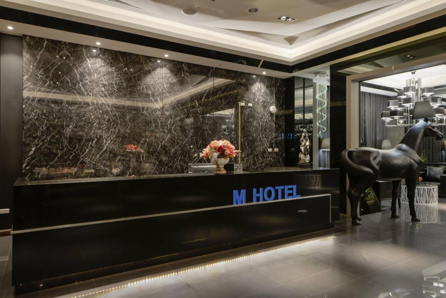 M Hotel Caotun Bagian luar foto