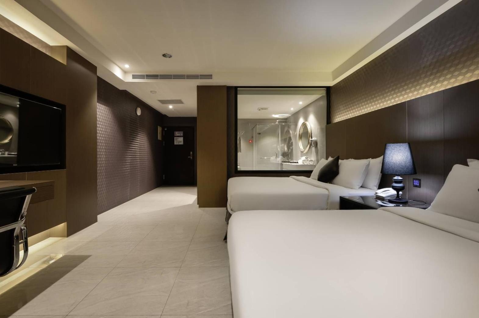 M Hotel Caotun Bagian luar foto