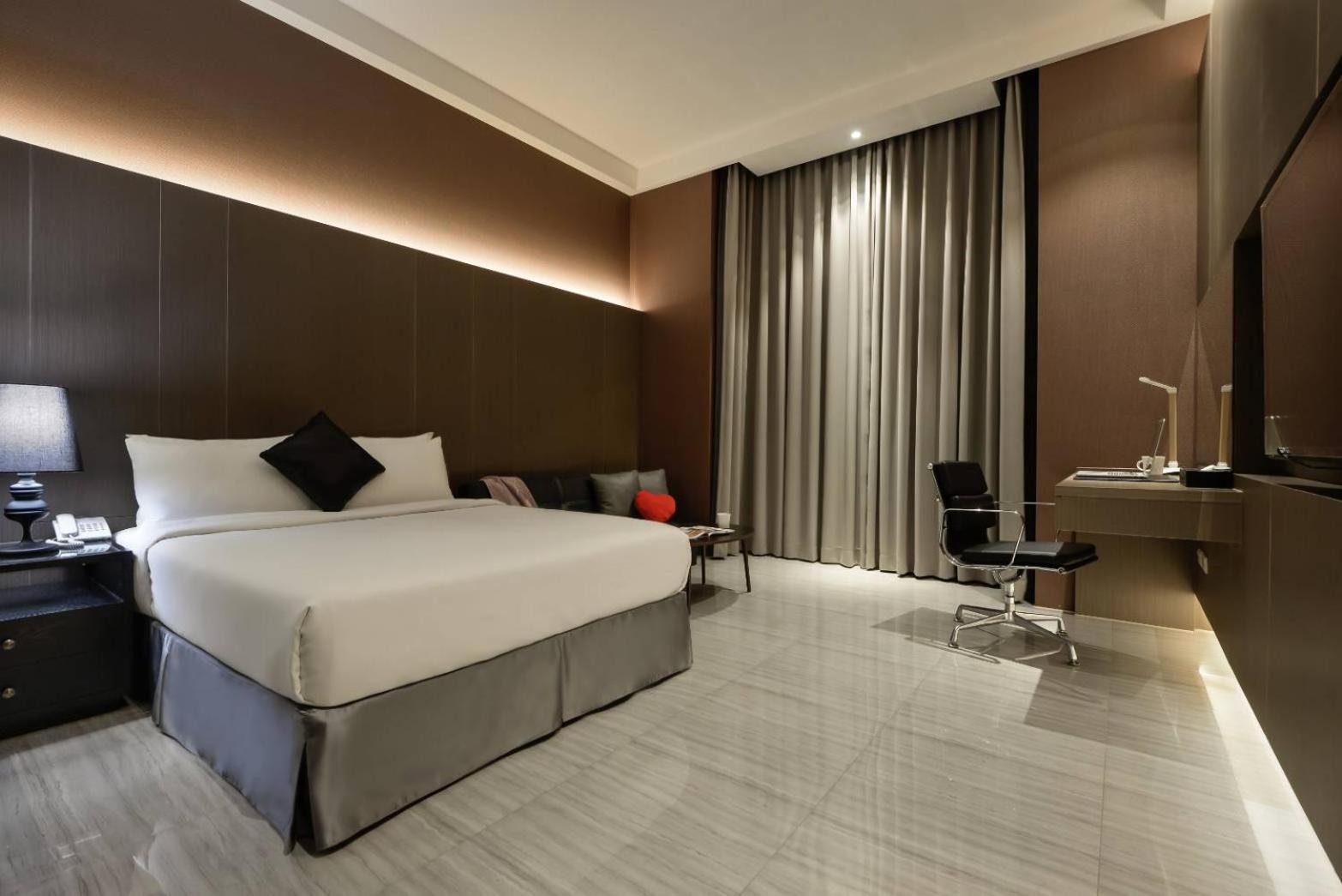 M Hotel Caotun Bagian luar foto